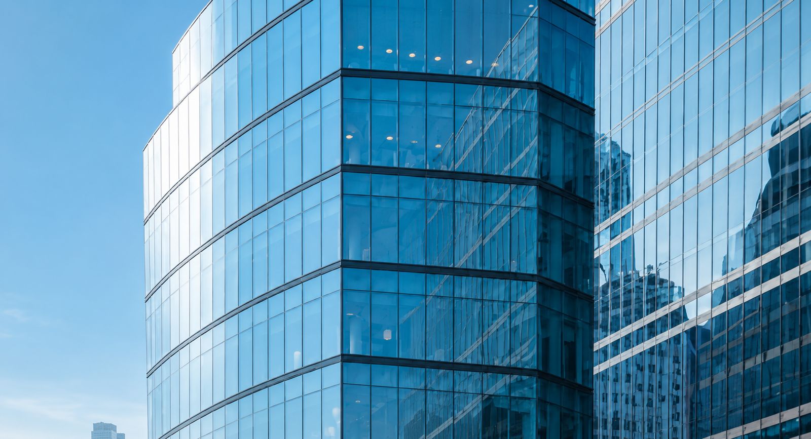 Abstract glass facade of a modern skyscraper